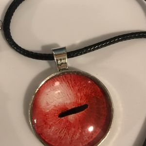 Red eye pendant necklace